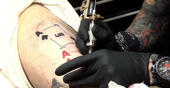 Poker Tattoo On Man Left Sleeve by Mark